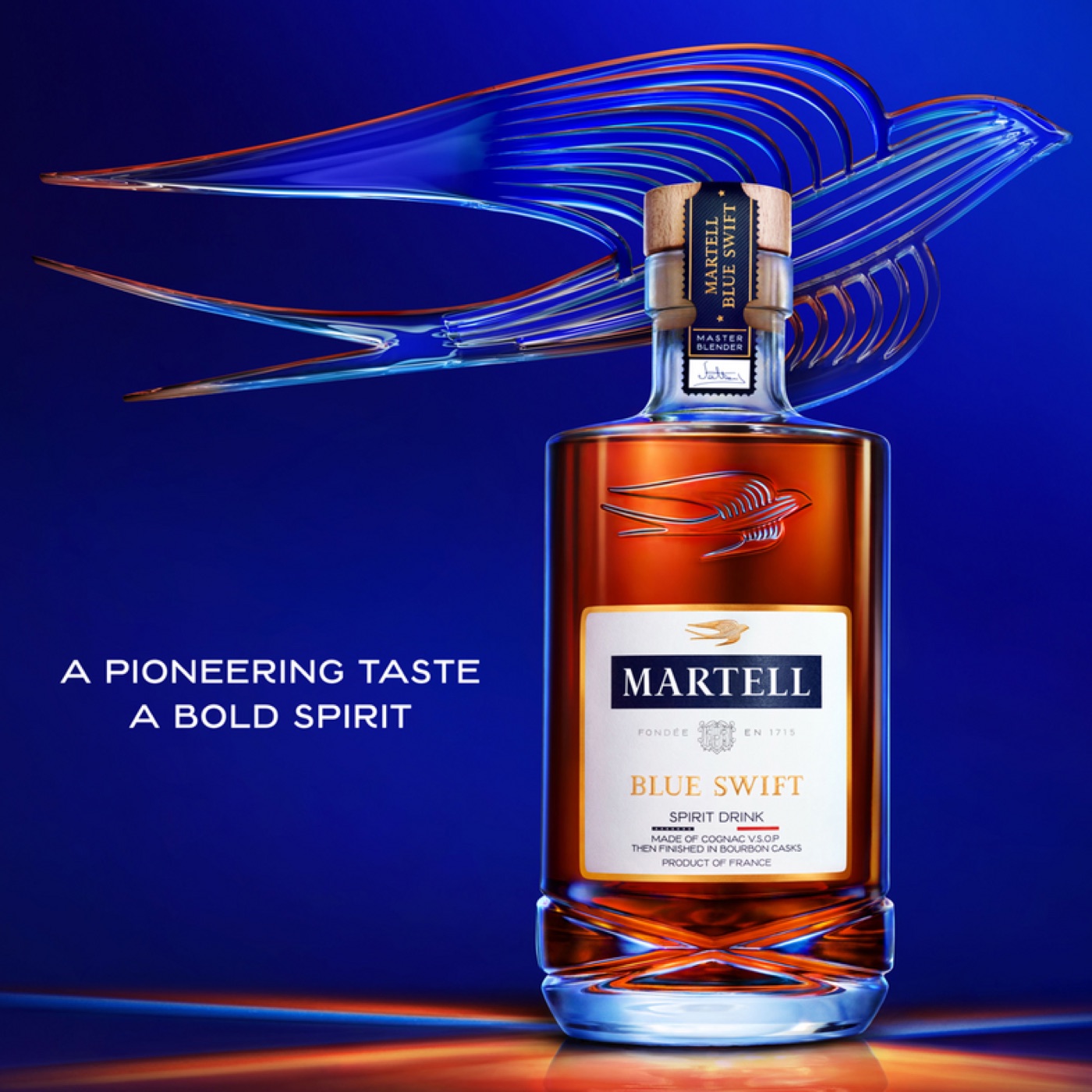 Martell Blue Swift bottle against the cognac house's deep blue swift artwork